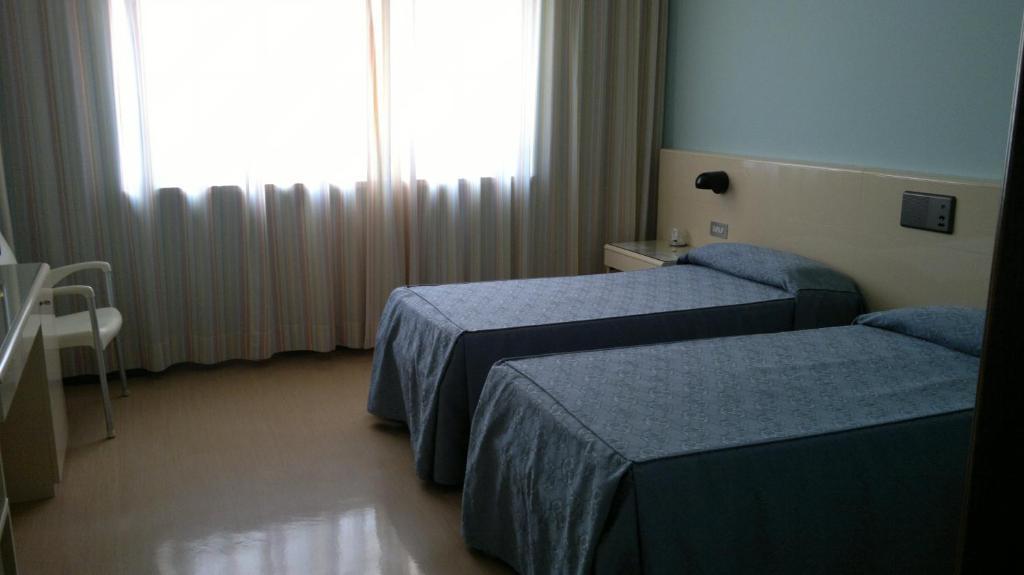 Albergo Casa Dell'Ospite Μπρέσια Δωμάτιο φωτογραφία